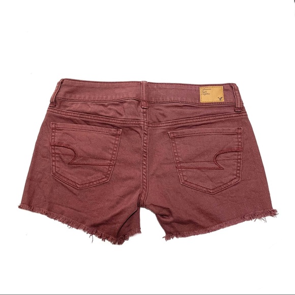 American Eagle Burgundy Stretch Distress Hemline Jean Short Size 0 - Picture 2 of 9